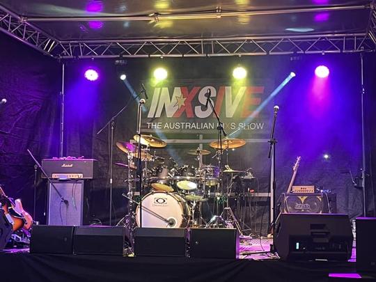 drums, guitar and stage-mounted speaker Synergy Productions